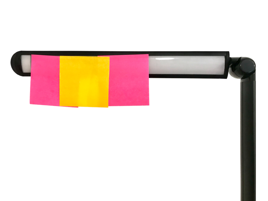 A horizontal light is partially covered up with pink and yellow sticky notes